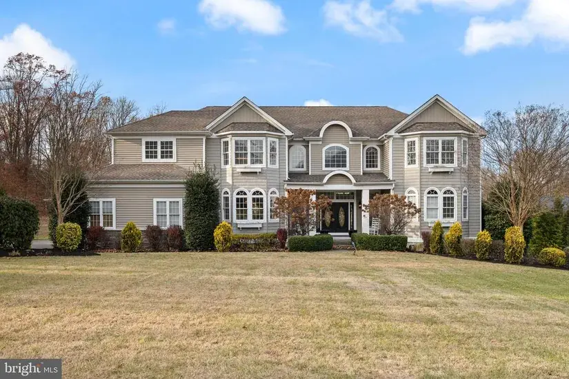 Featured luxury estate at 205 Sherwin Road, Mullica Hill, New Jersey, showing the front exterior and landscaped grounds